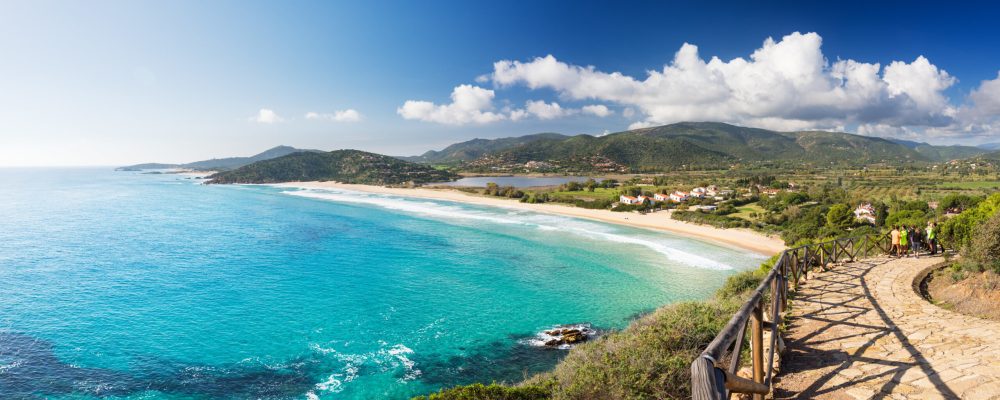 Coast with long beach, view from the promontory in a sunny day - Sardinia, Santa Margherita; Chia beach